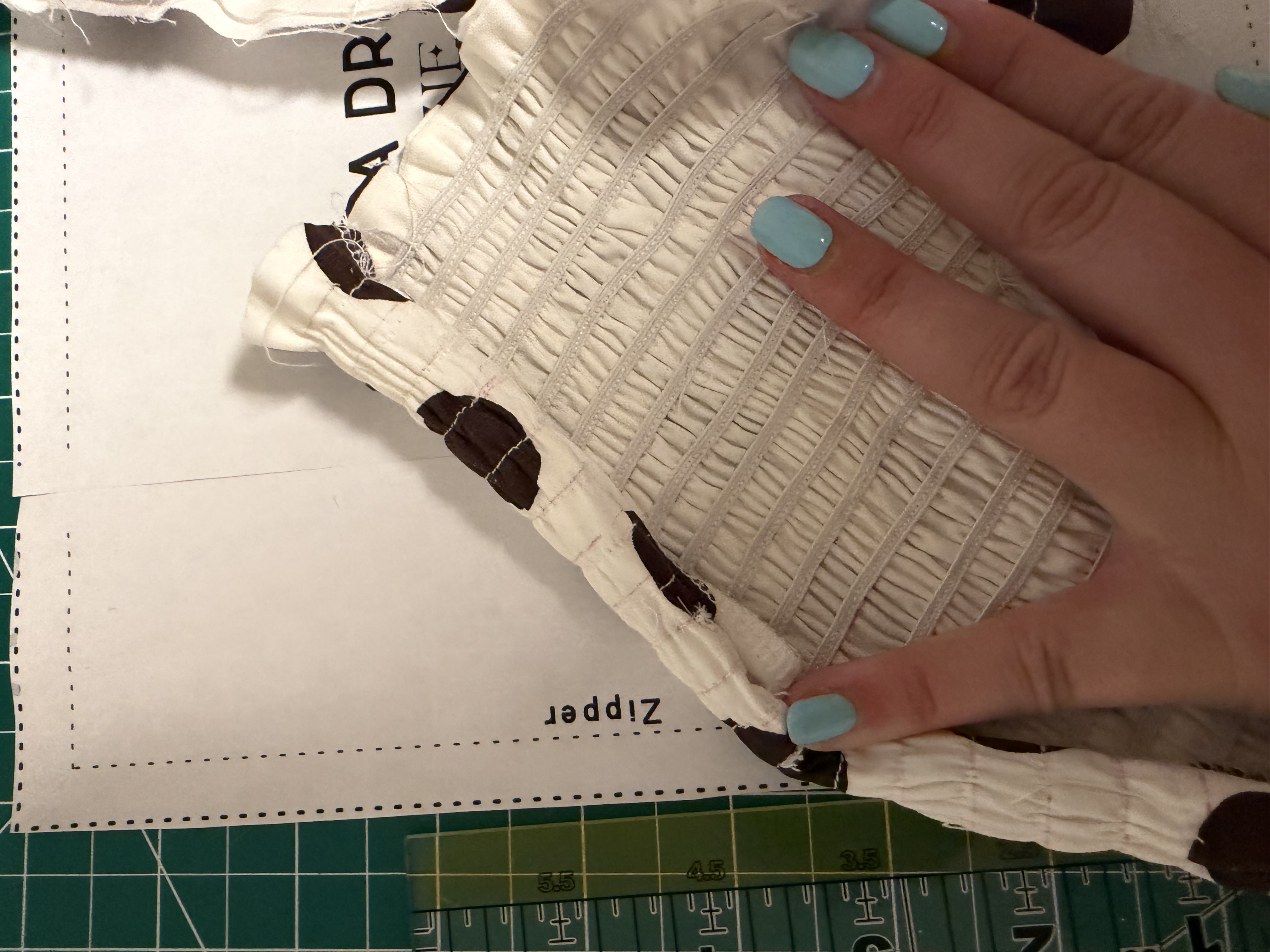 Braided elastic sewn directly onto the back panel to create the shirring effect